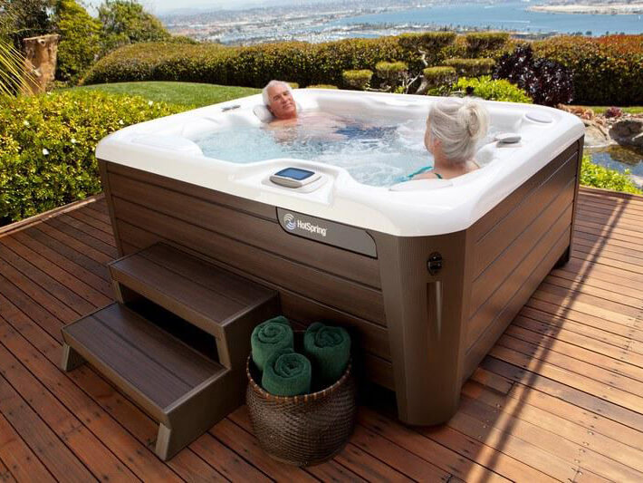 Hot-tubbing in the Highlife® Jetsetter® NXT with an ocean view.