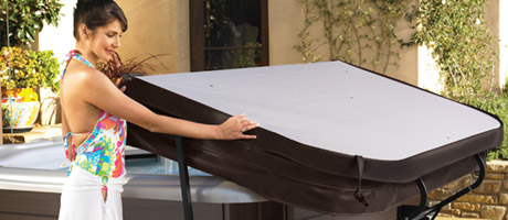 Woman demonstrating ease of cover lifter