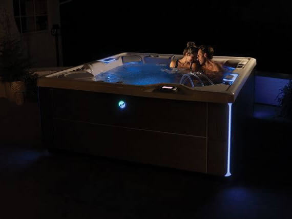 Premium hot tubs feature LED light displays in brilliant colors.