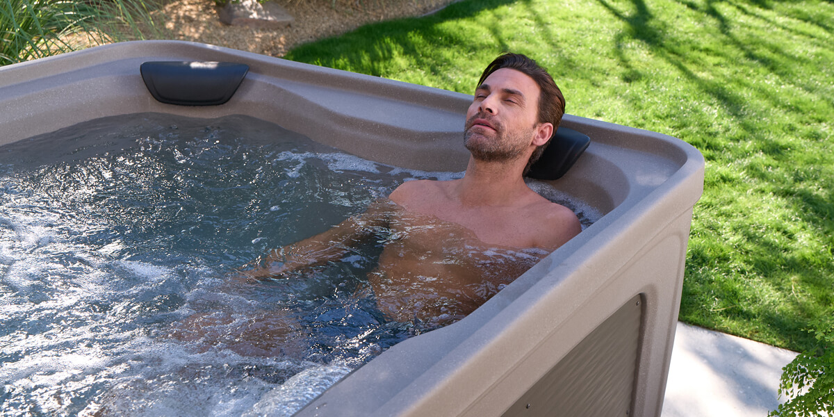 Freeflow Collection Owner Relaxing in an Azure in Dune Diamond Weave